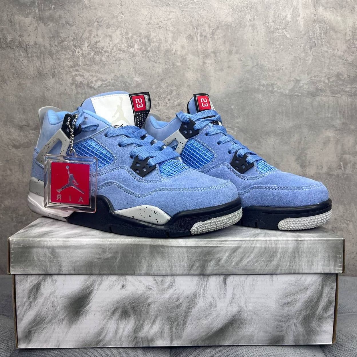 Купить Nike Air Jordan 4 Retro University Blue