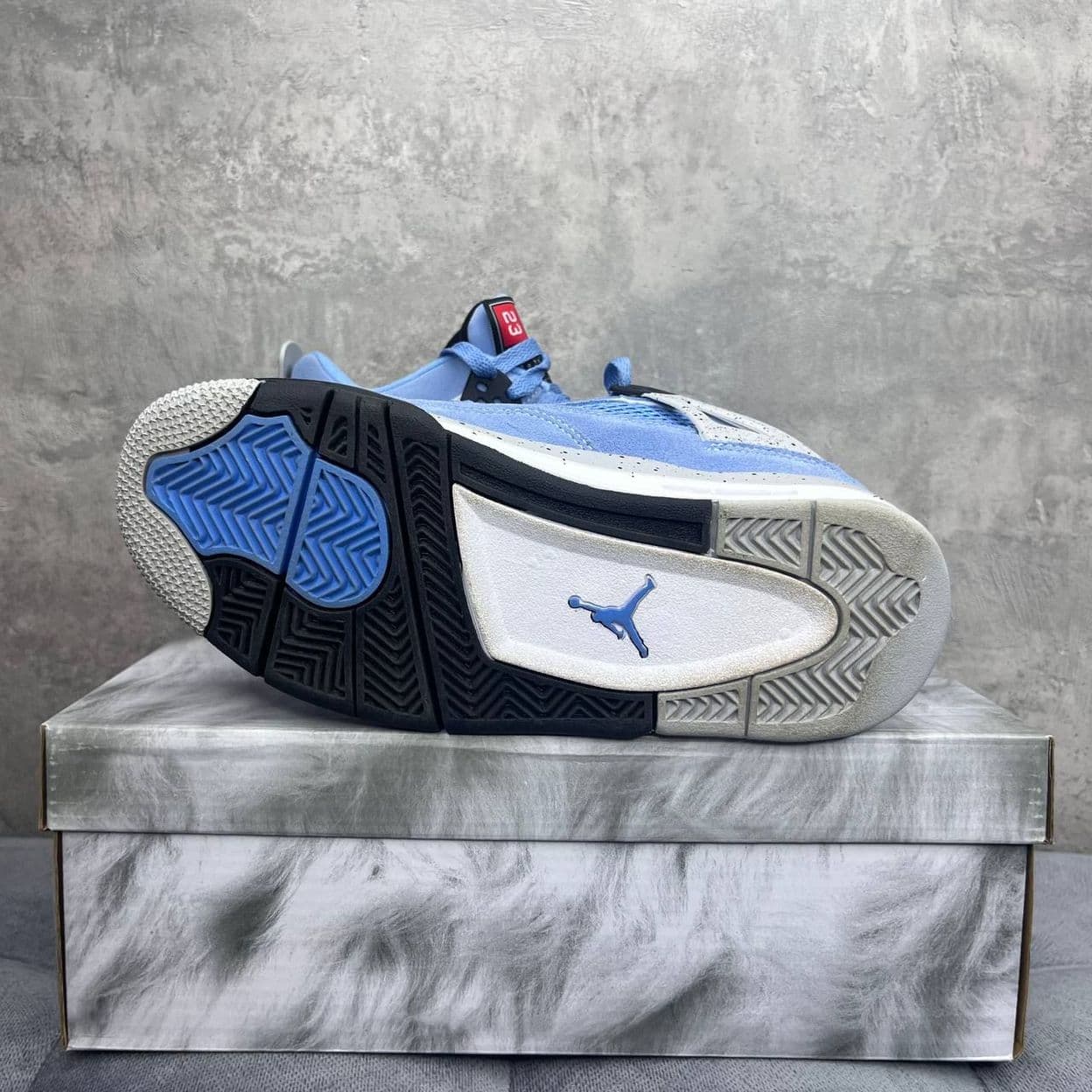Купить Nike Air Jordan 4 Retro University Blue